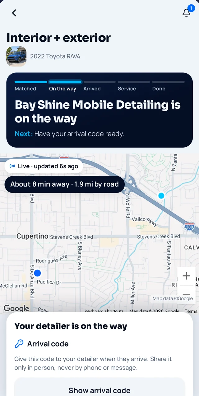 App screen: your detailer is on the way — live map, about 8 minutes away, arrival code
